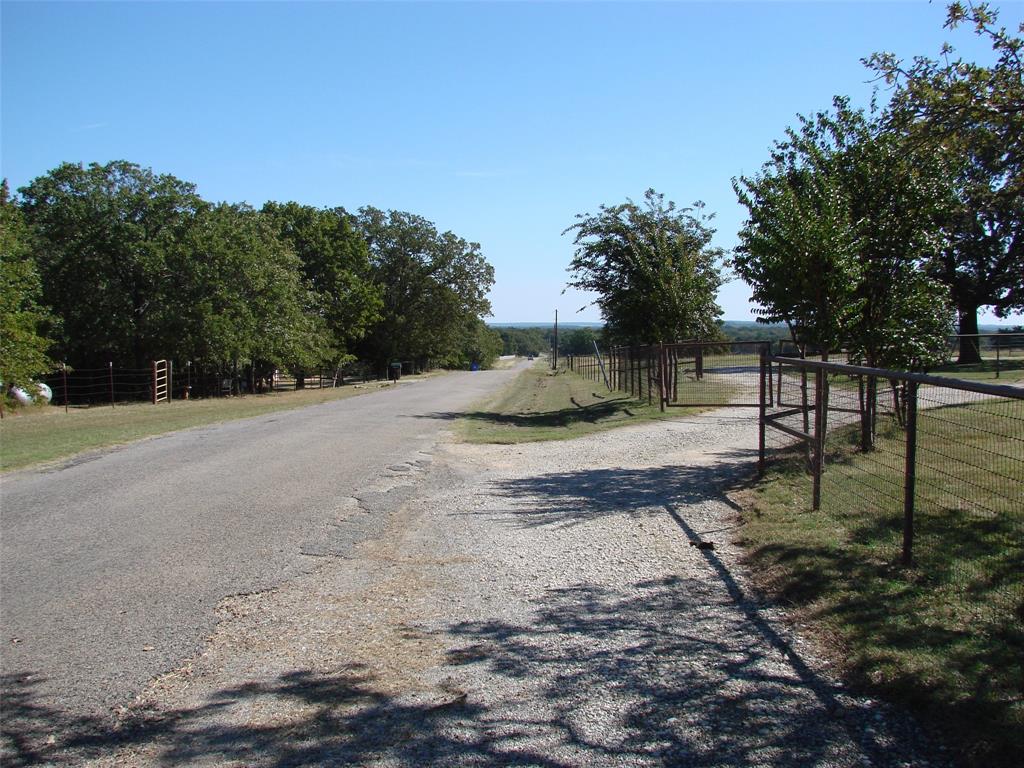 34 Denton Road Gordonville, TX 76245 - Photo 34 of 35 View of asphalt road featuring a rural view