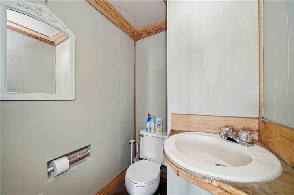 520 Waleska Road Canton, GA 30114 - Photo 11 of 33 a bathroom with a sink and a toilet