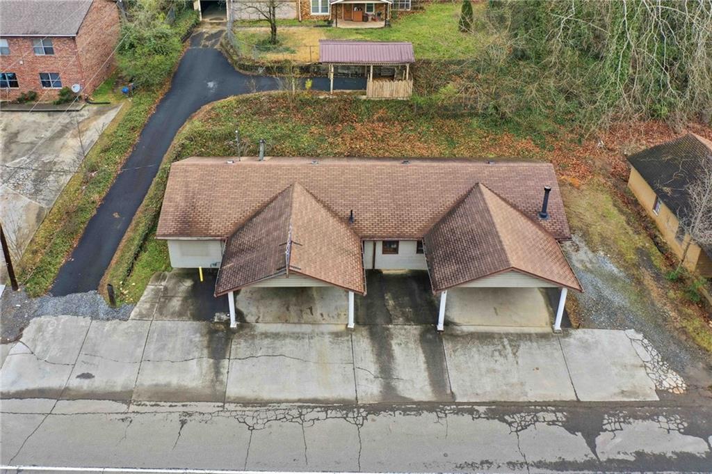 520 Waleska Road Canton, GA 30114 - Photo 27 of 33 an aerial view of a house with large trees