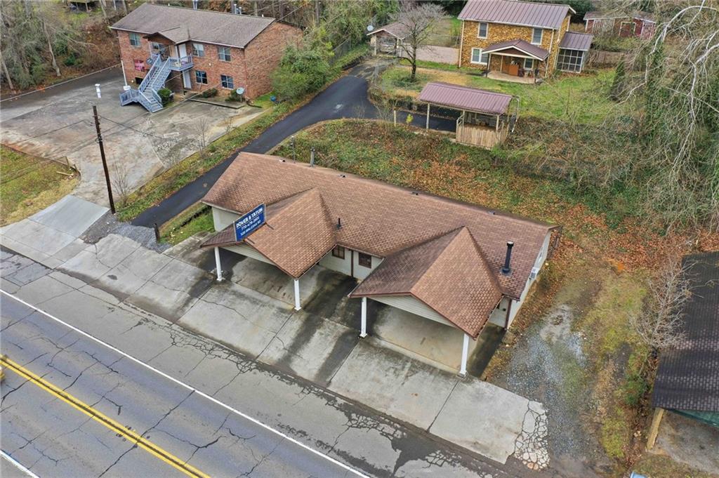 520 Waleska Road Canton, GA 30114 - Photo 28 of 33 a aerial view of a house with a yard