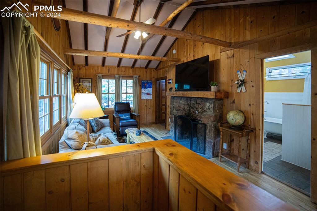 5870 Paona Road Cascade, CO 80809 - Photo 8 of 27 a view of living room with furniture and a flat screen tv