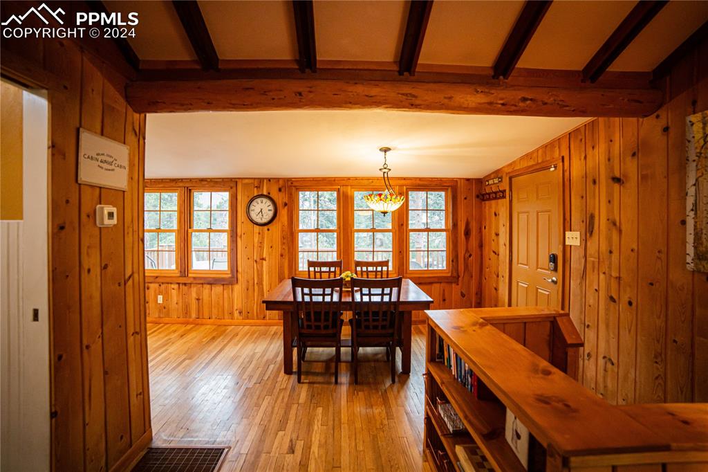 5870 Paona Road Cascade, CO 80809 - Photo 10 of 27 a view of a dining room with furniture window and outside view