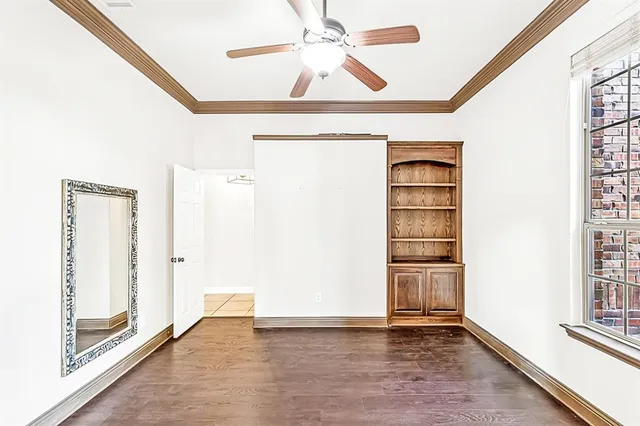 a view of an entryway with wooden floor