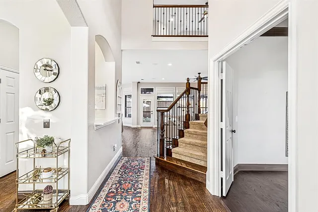 a view of entryway with wooden floor
