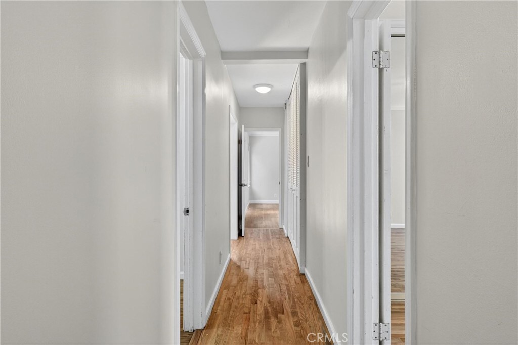 608 35th Street Manhattan Beach, CA 90266 - Photo 15 of 27 a view of a hallway with wooden floor