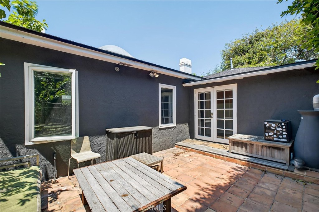 608 35th Street Manhattan Beach, CA 90266 - Photo 20 of 27 a balcony with furniture and a potted plant