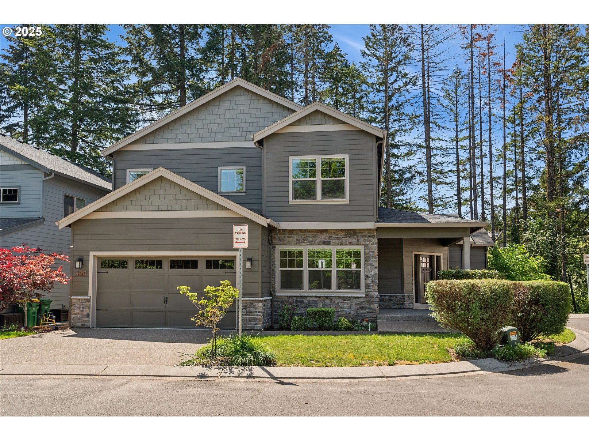 a front view of a house with yard