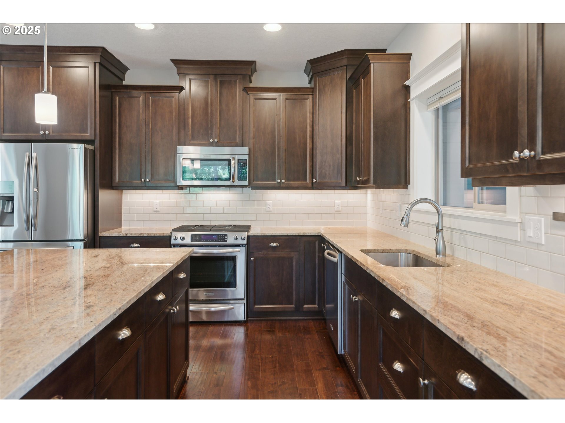 14320 Southwest Fox Lane Beaverton, OR 97008 - Photo 14 of 48 a kitchen with a sink stove and cabinets