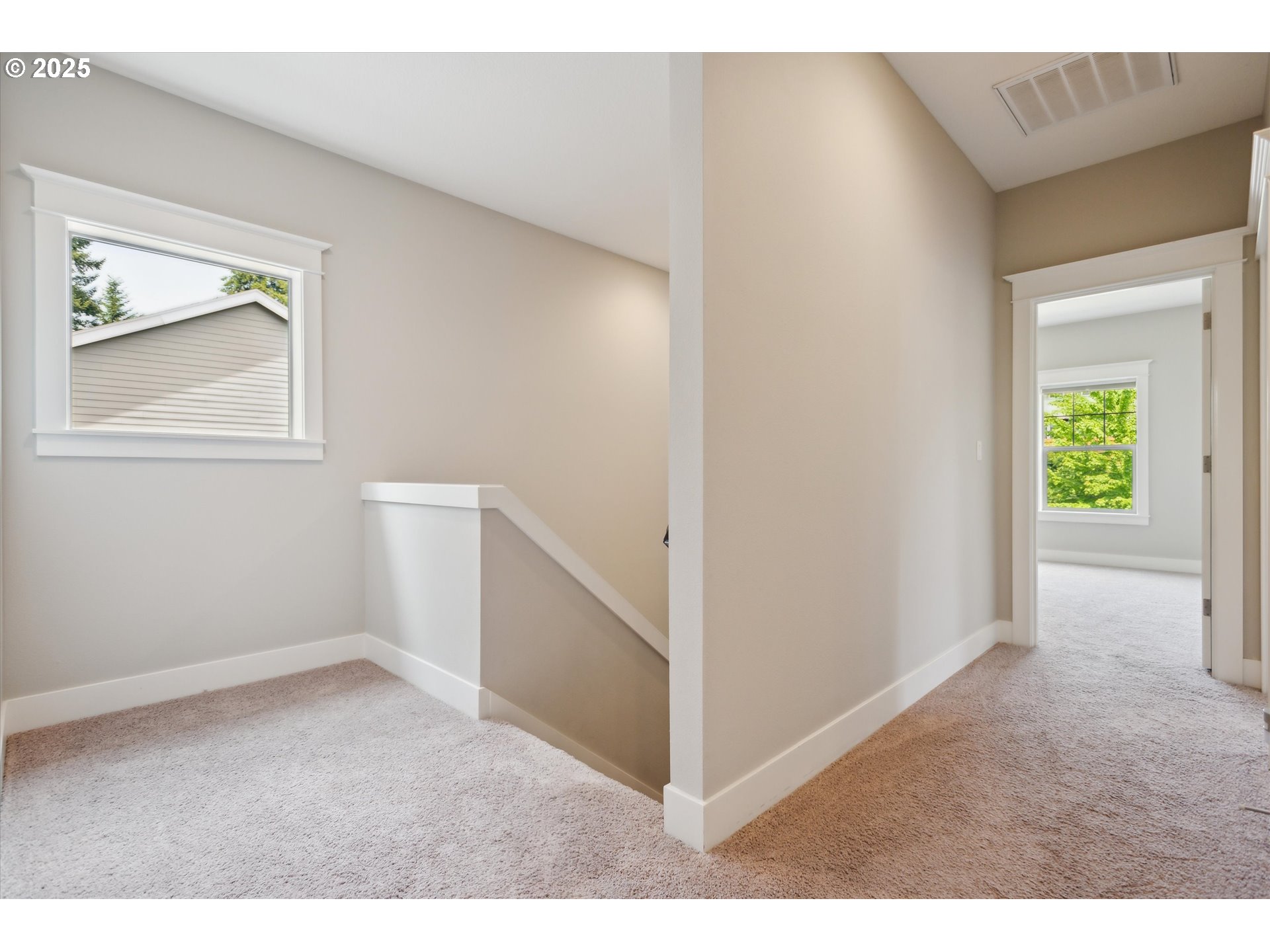 14320 Southwest Fox Lane Beaverton, OR 97008 - Photo 18 of 48 an empty room with windows and closet