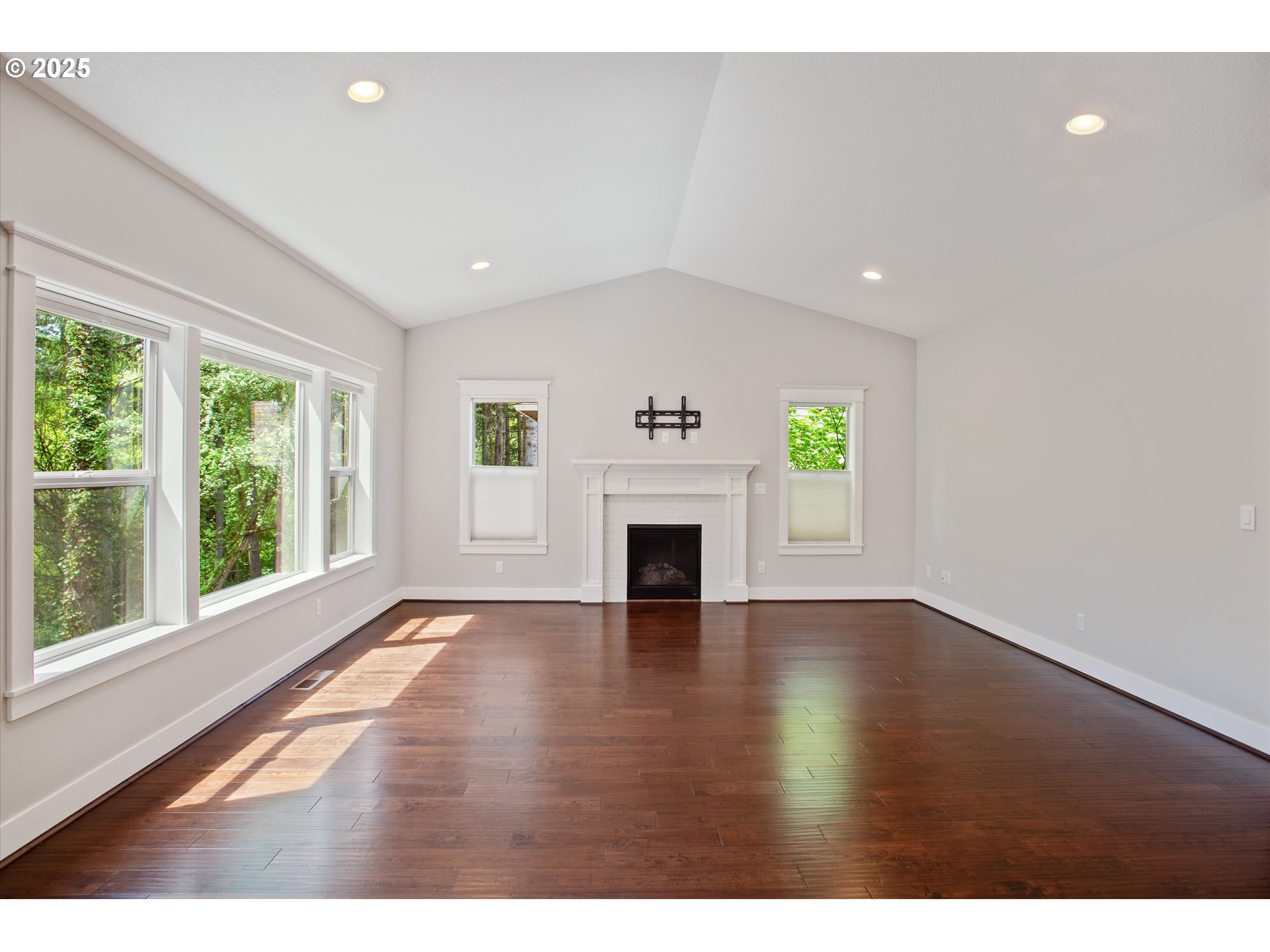 14320 Southwest Fox Lane Beaverton, OR 97008 - Photo 8 of 48 a view of empty room with a fireplace