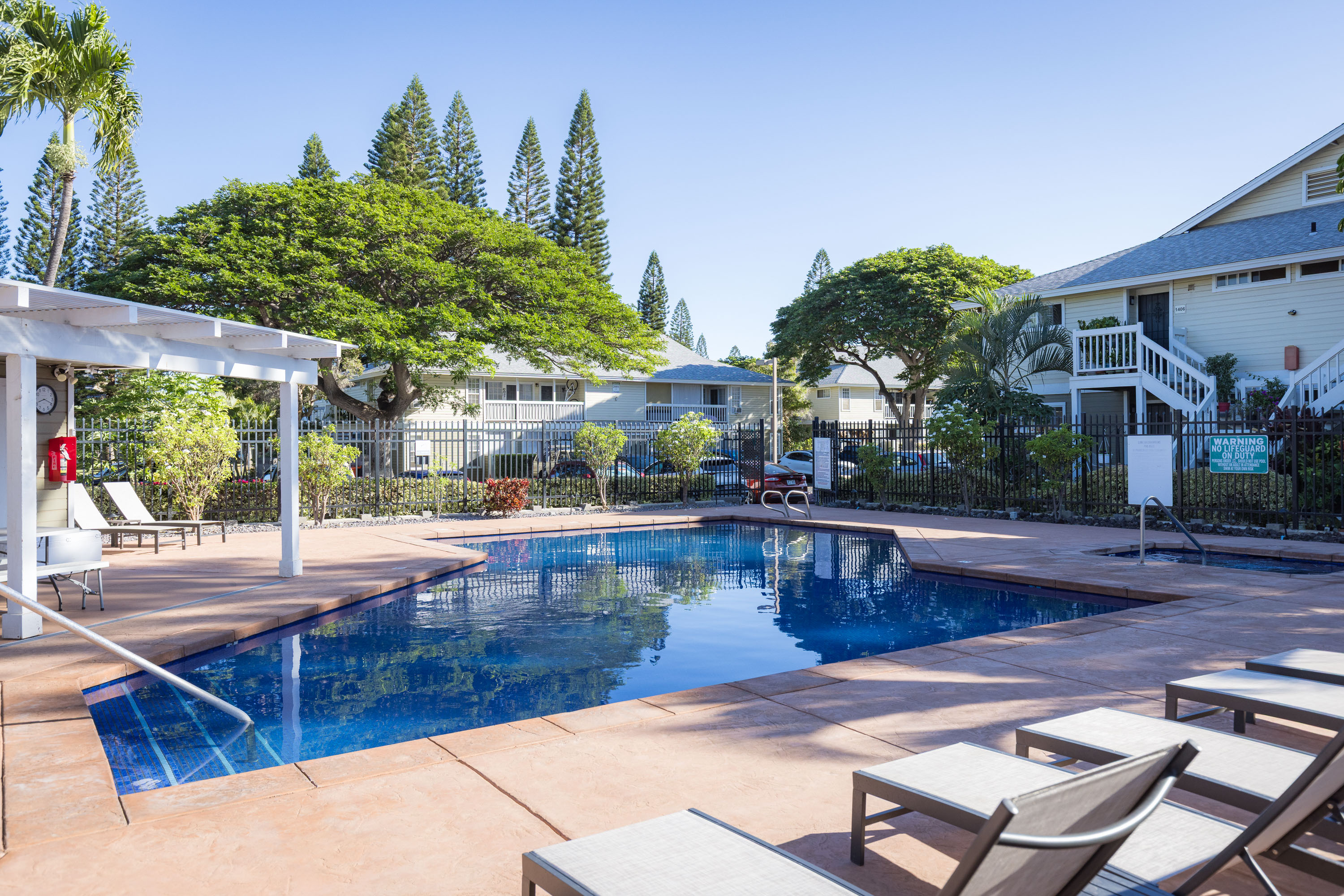 68-3890 Lua Kula Street, Unit 1408 Waikoloa, HI 96738 - Photo 20 of 22 a view of a swimming pool with sitting area