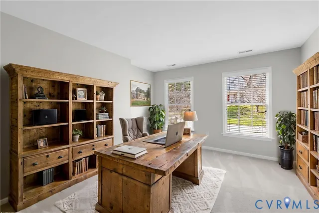 a kitchen with stainless steel appliances granite countertop a stove and a refrigerator