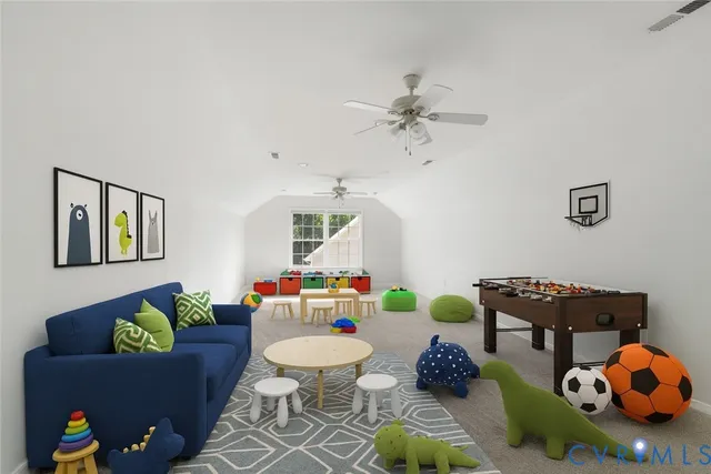 a living room with furniture and a rug