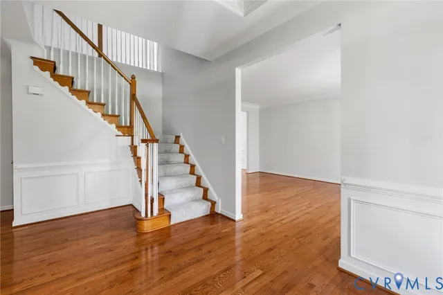 a view of entryway with wooden floor