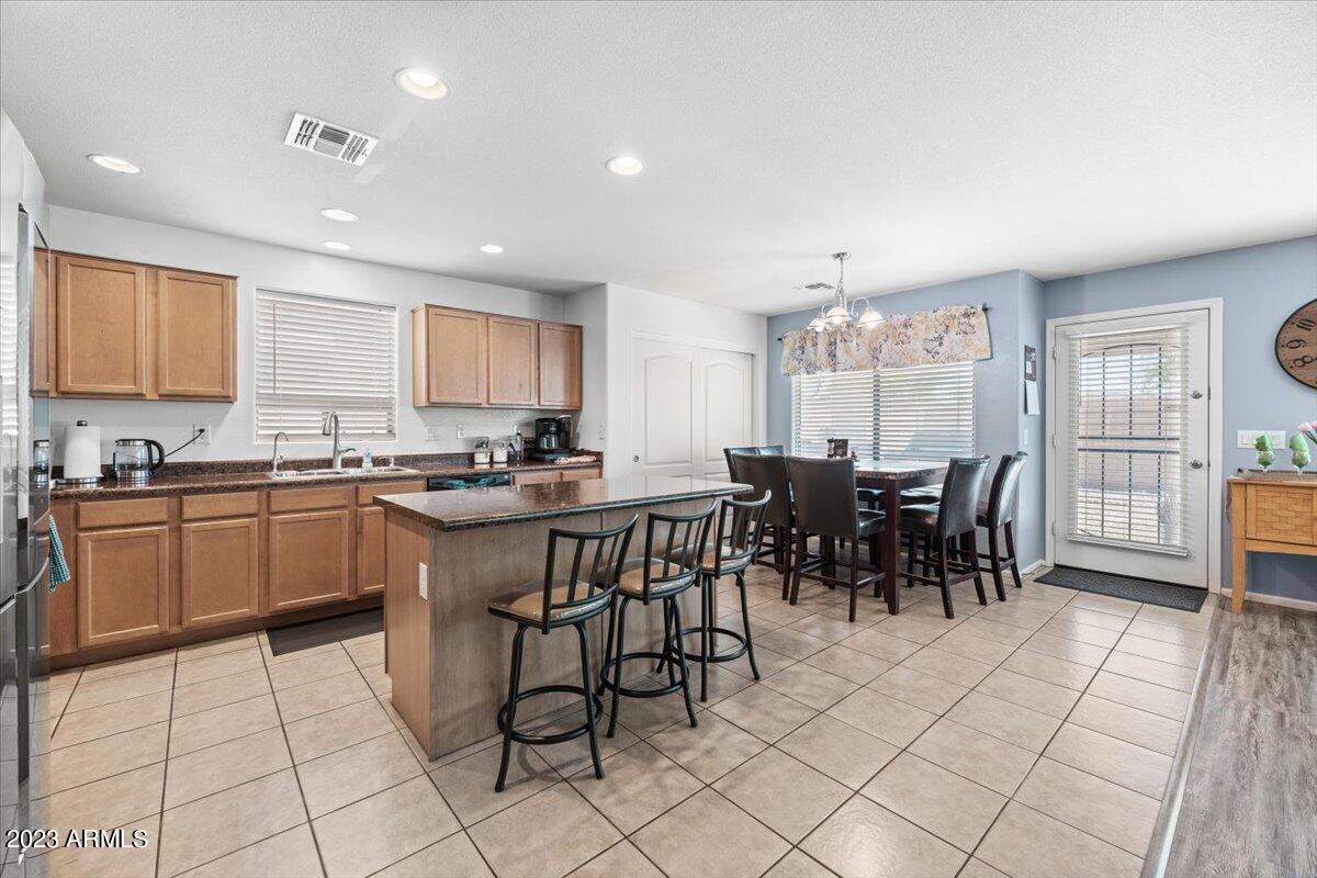 3475 South Rim Road Gilbert, AZ 85297 - Photo 6 of 16 09-Kitchen and Dining