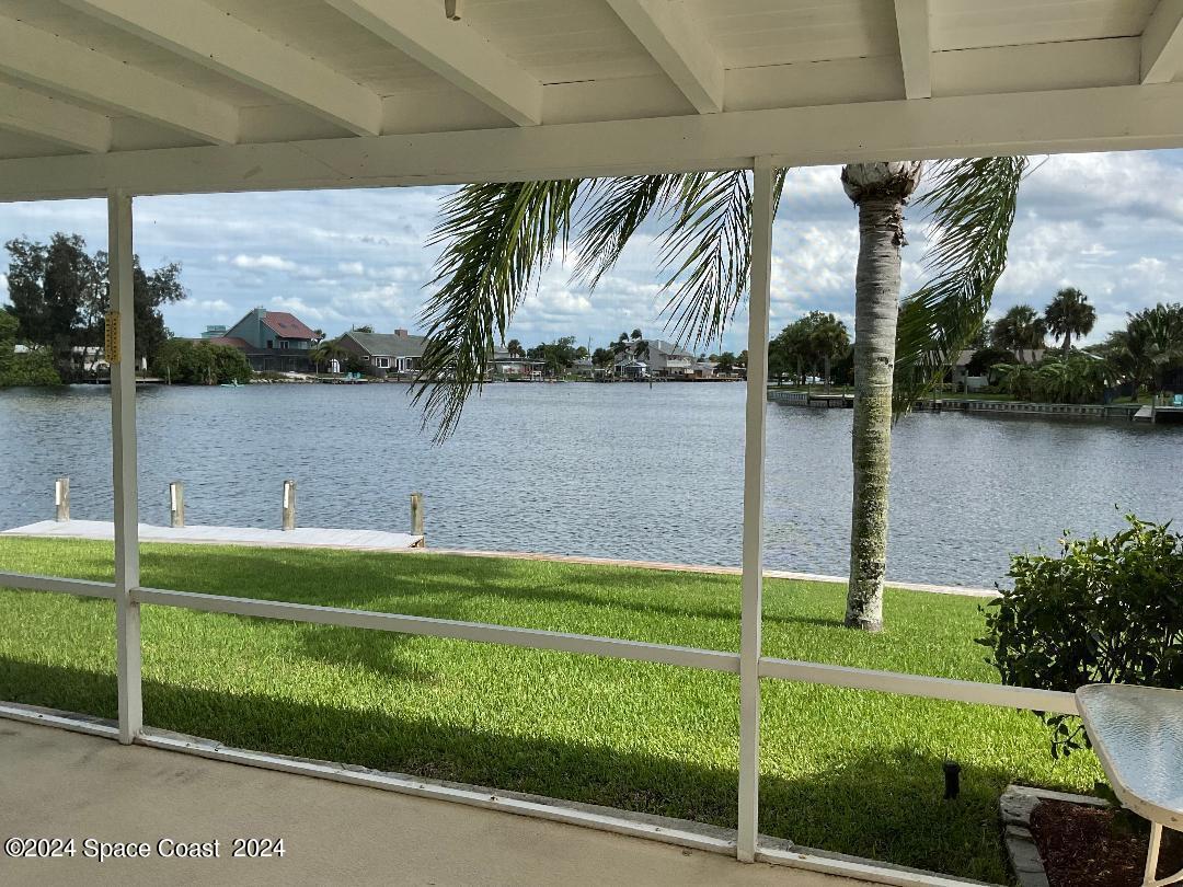 1725 Reef Court Merritt Island, FL 32952 - Photo 4 of 5 a view of a lake from a living room