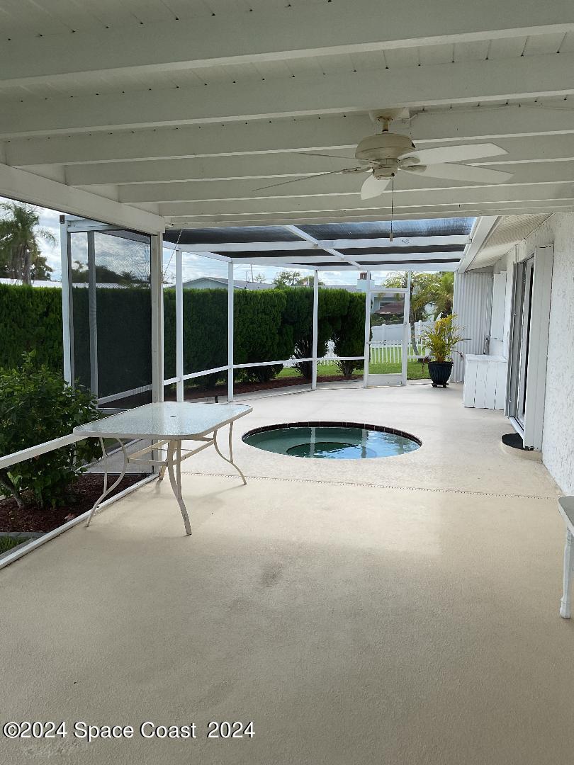 1725 Reef Court Merritt Island, FL 32952 - Photo 5 of 5 a view of a swimming pool with a patio