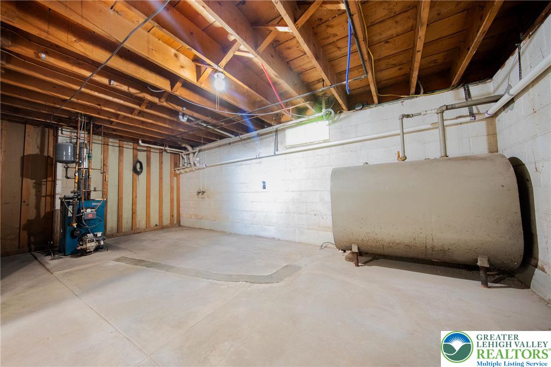 4008 State Road Coopersburg, PA 18036 - Photo 15 of 19 A utilitarian basement provides ample storage and houses essential mechanical systems.