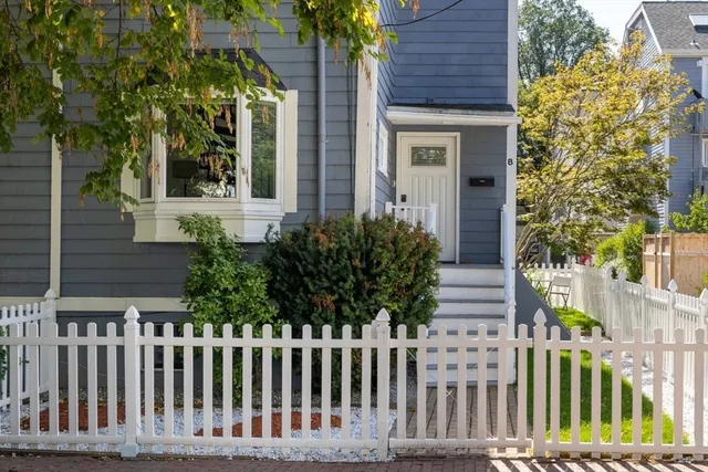 a front view of a house having yard