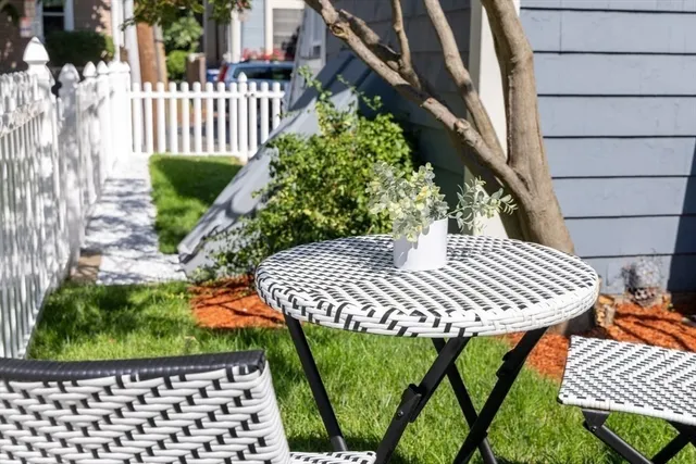 a view of a patio in backyard