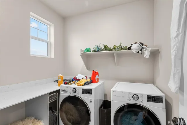 a utility room with dryer and washer