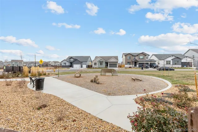a view of a swimming pool with a terrace