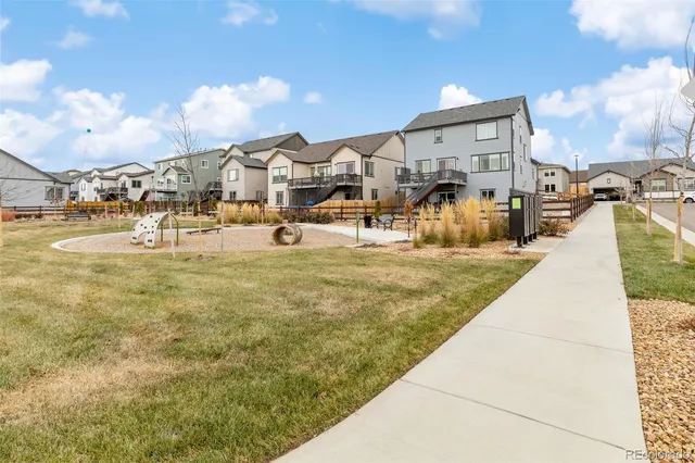 a large building with trees in front of it