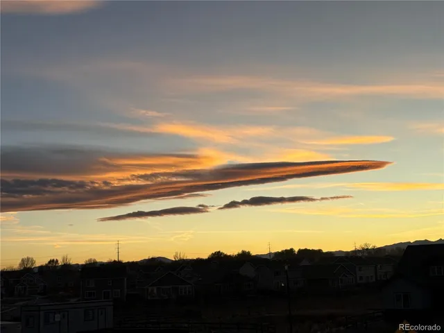 a view of an ocean and a mountain