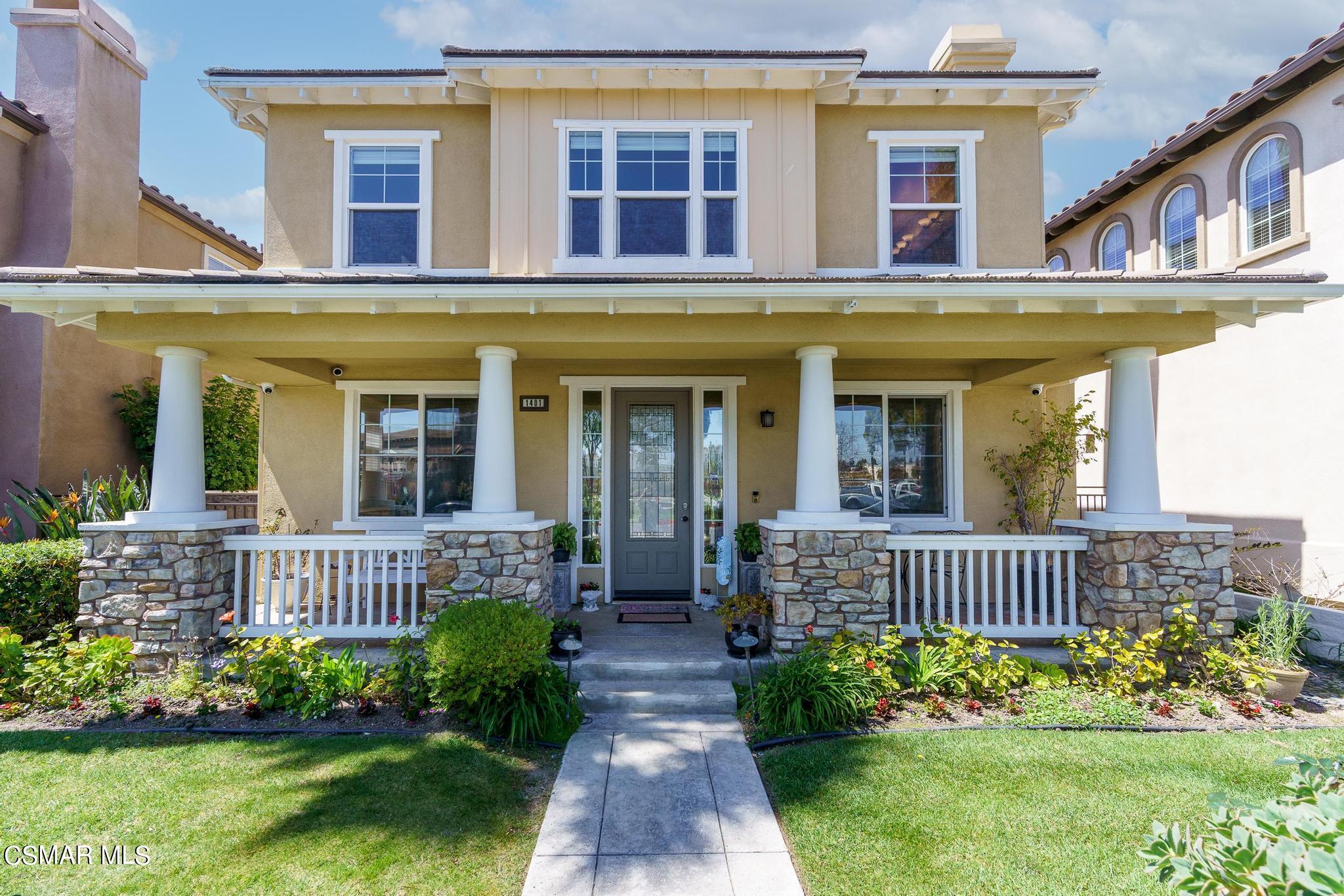 1401 Seabridge Lane Oxnard, CA 93035 - Photo 1 of 1 a front view of a house with garden