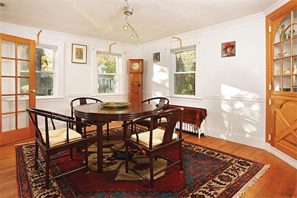 63 Garland Road Newton, MA 02459 - Photo 3 of 6 a view of a dining room with furniture and a window