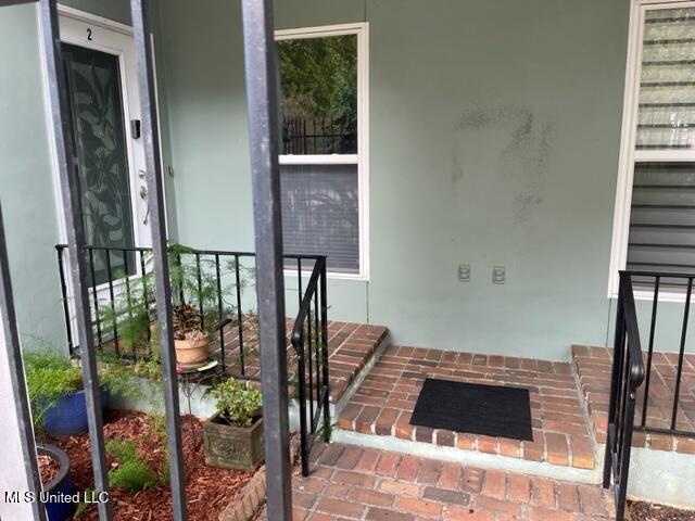 1916 2nd Street, Unit 2 Gulfport, MS 39501 - Photo 3 of 10 Gated Front Entry