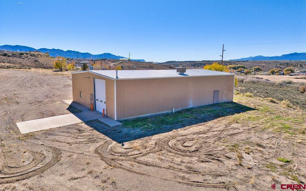 1791 Industrial Road Cortez, CO 81321 - Photo 11 of 42 a view of a terrace with a lake