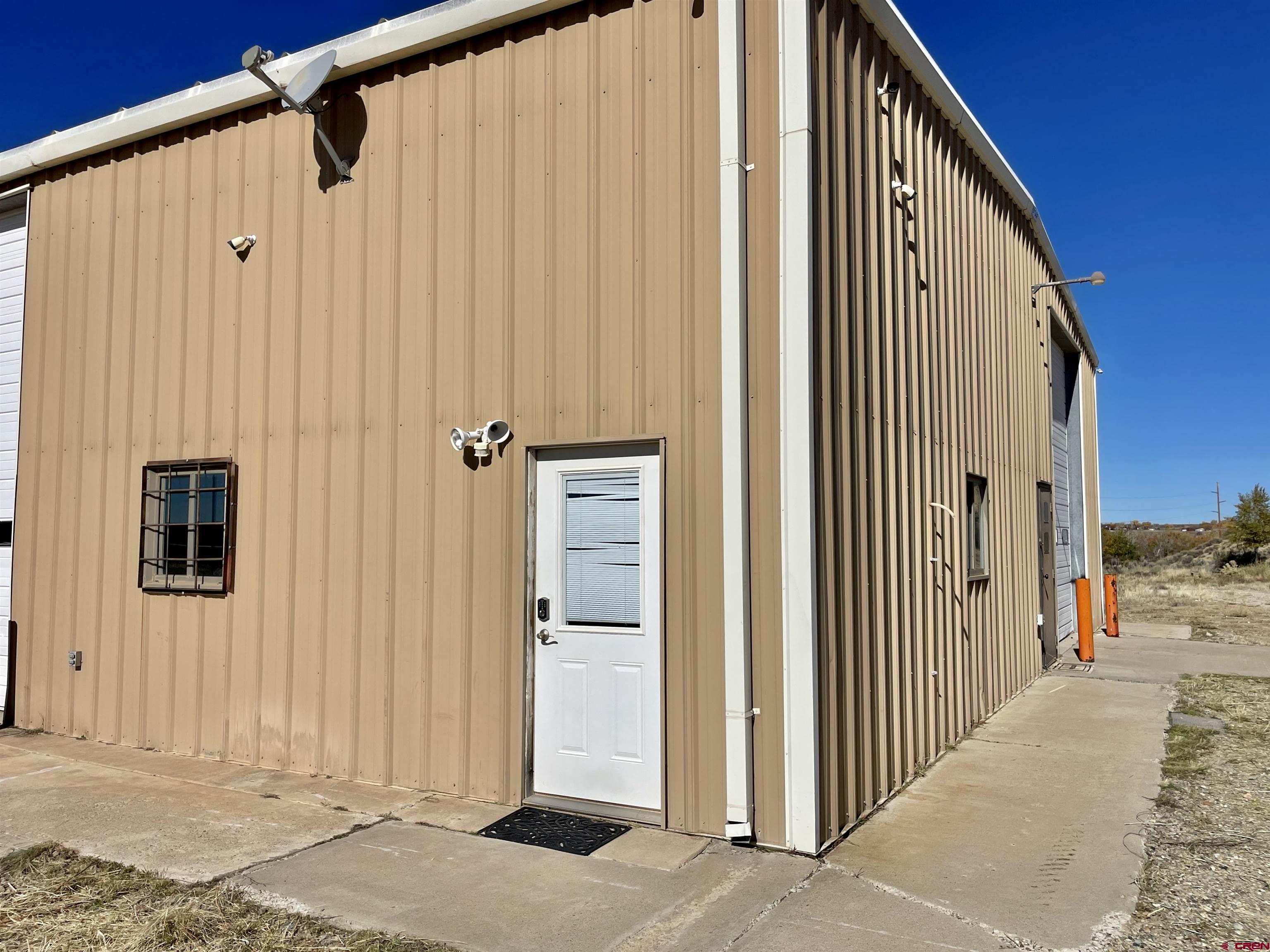 1791 Industrial Road Cortez, CO 81321 - Photo 18 of 42 a view of a house with a outdoor space