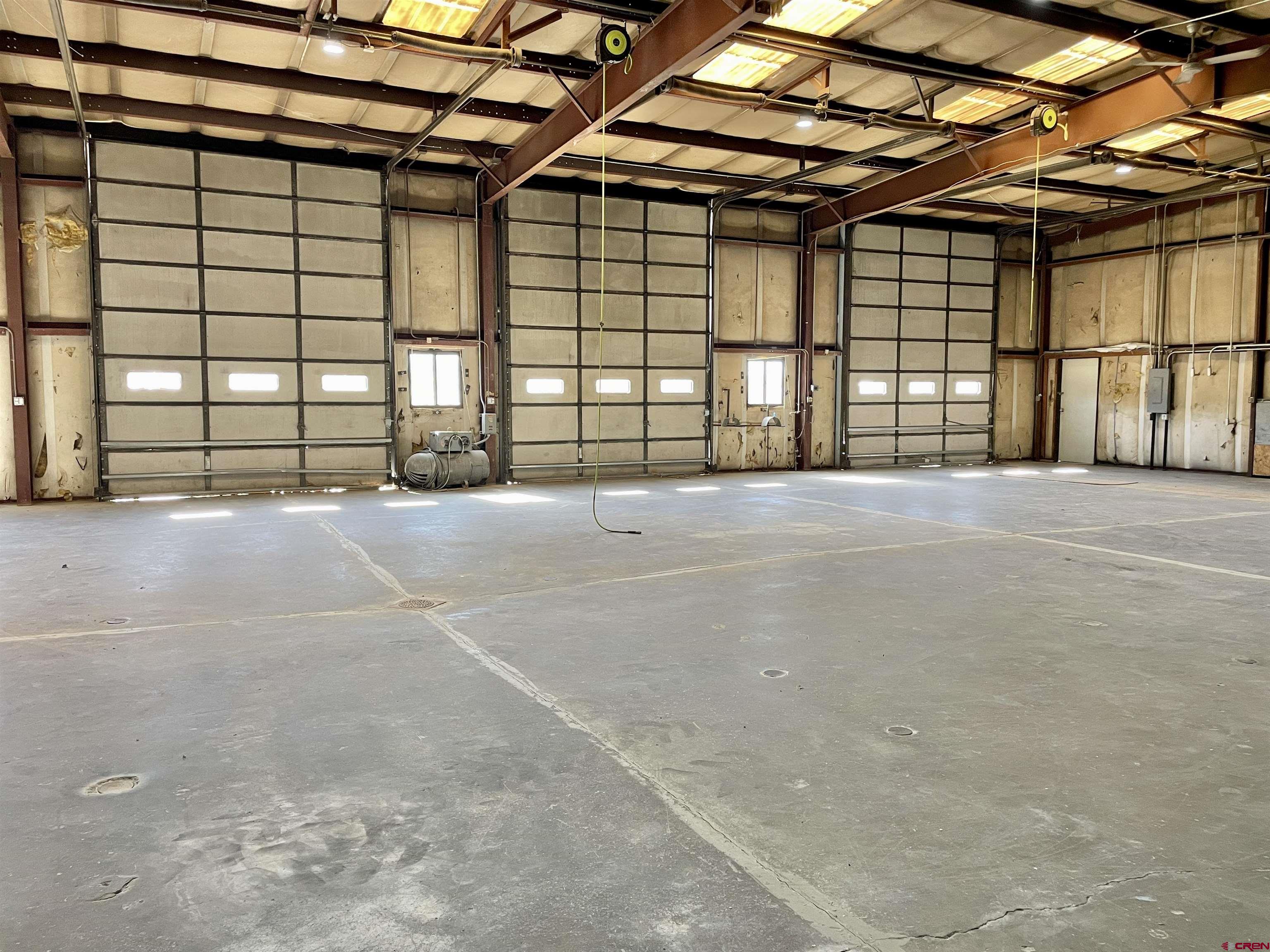 1791 Industrial Road Cortez, CO 81321 - Photo 22 of 42 a view of an empty room with a balcony