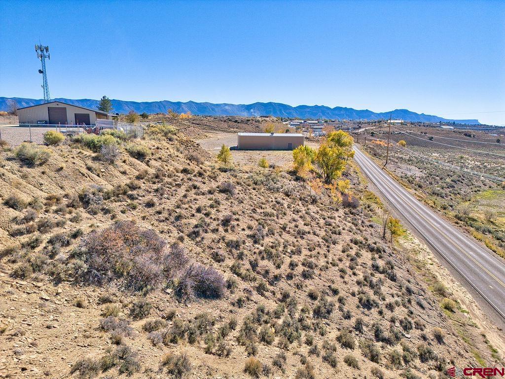 1791 Industrial Road Cortez, CO 81321 - Photo 32 of 42 a view of a lake with a mountain