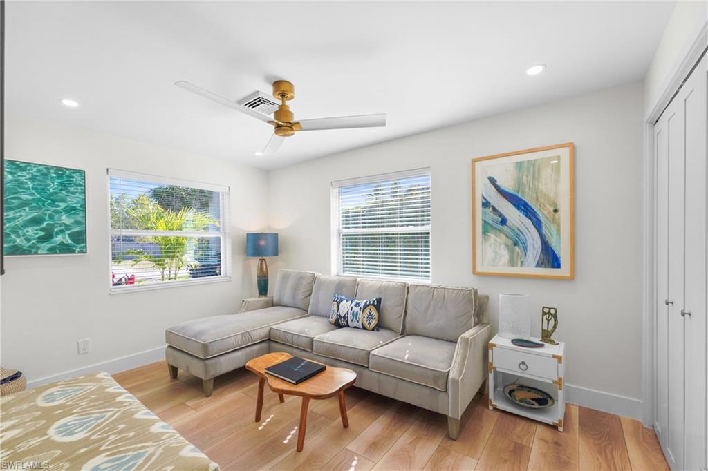 2855 10th Street North Naples, FL 34103 - Photo 17 of 29 a living room with furniture and a window