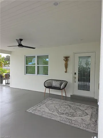 a view of a livingroom with furniture and wooden floor