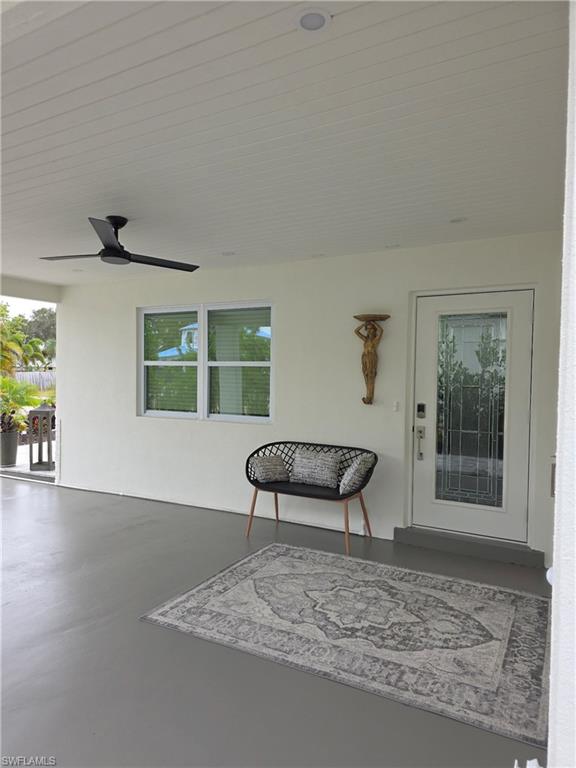 2855 10th Street North Naples, FL 34103 - Photo 26 of 29 a view of a livingroom with furniture and wooden floor