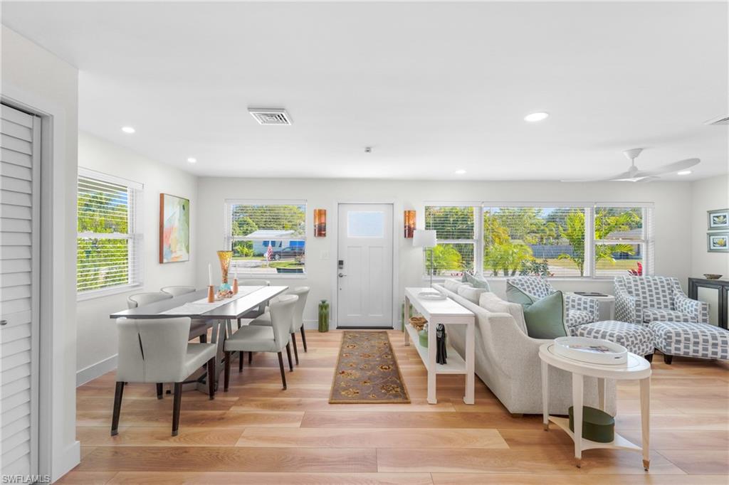 2855 10th Street North Naples, FL 34103 - Photo 8 of 29 a view of a dining room with furniture window and outside view