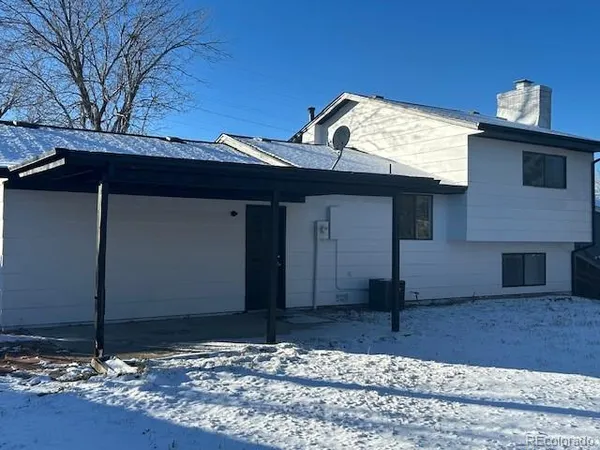 a view of a house with a garage