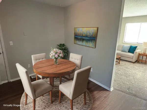 a view of a dining room with furniture
