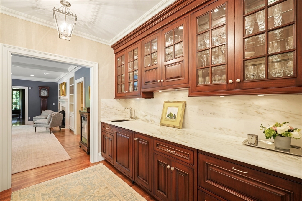 3 Ravine Road Wellesley, MA 02481 - Photo 11 of 33 a spacious bathroom with a sink and a large mirror
