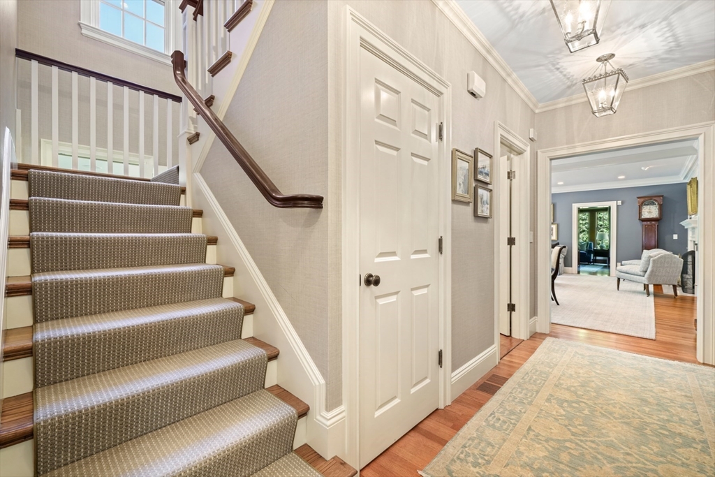 3 Ravine Road Wellesley, MA 02481 - Photo 15 of 33 a view of entryway and hall with wooden floor