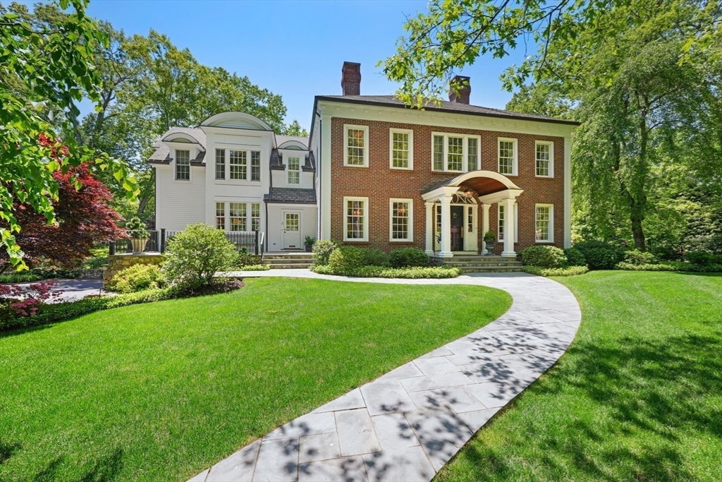 3 Ravine Road Wellesley, MA 02481 - Photo 2 of 33 a front view of a house with a yard