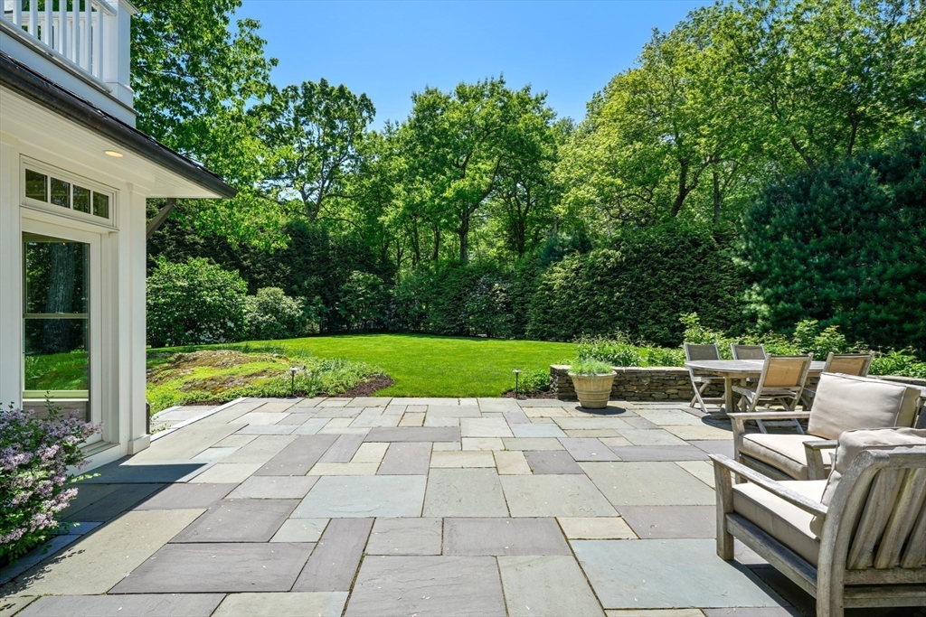 3 Ravine Road Wellesley, MA 02481 - Photo 30 of 33 a view of backyard with seating area and green space