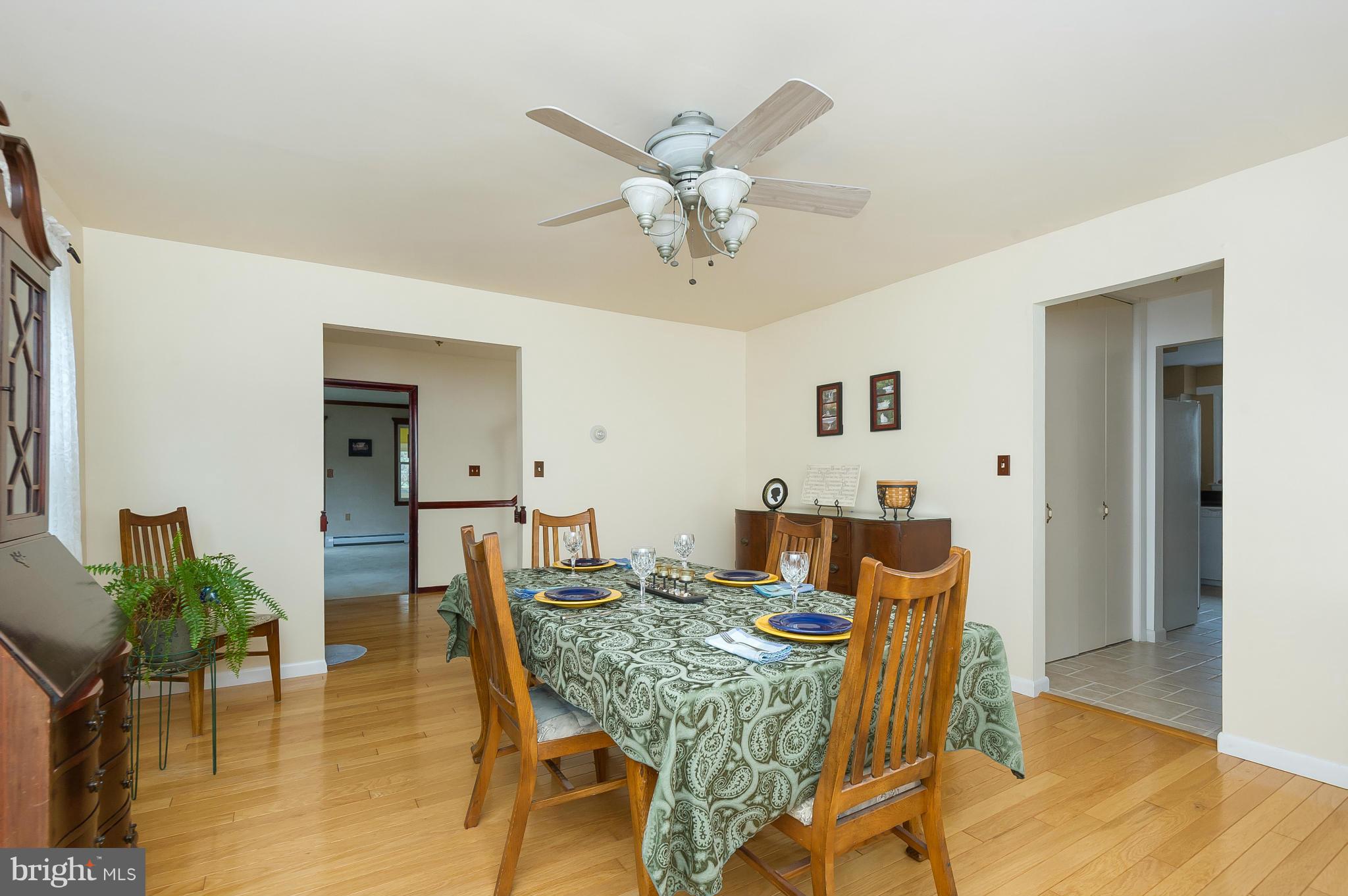 17213 Whiteley Road Monkton, MD 21111 - Photo 3 of 30 Gleaming Hardwood Floors in Dining Room
