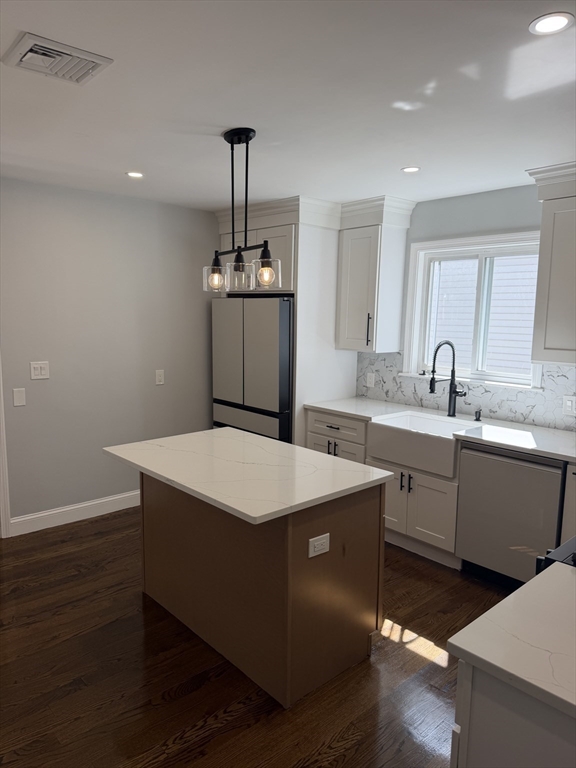 60-62 Wellsmere Road, Unit 2 Boston, MA 02131 - Photo 4 of 19 a kitchen with a sink a counter space and appliances