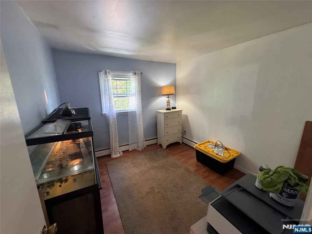 55 Maryann Road Oak Ridge, NJ 07438 - Photo 10 of 20 a room with furniture and gym equipment