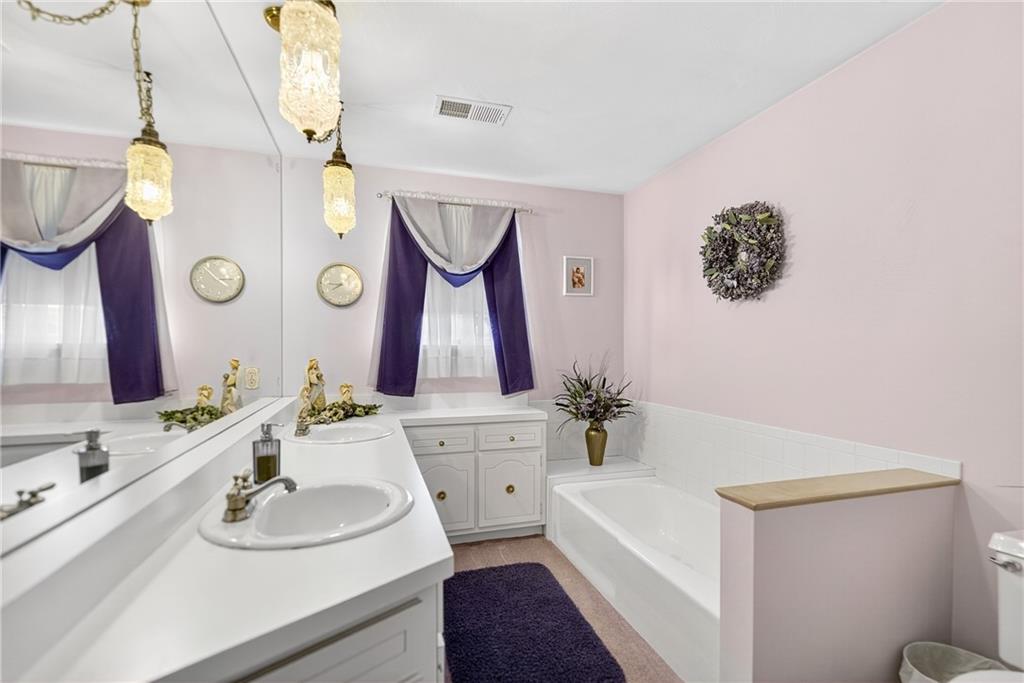 224 Rehoboth Road Belle Vernon, PA 15012 - Photo 16 of 46 a bathroom with a sink and a mirror