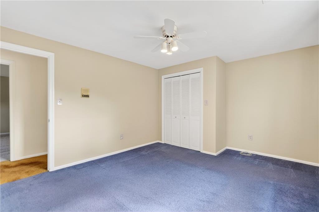 224 Rehoboth Road Belle Vernon, PA 15012 - Photo 18 of 46 a view of an empty room with a chandelier fan
